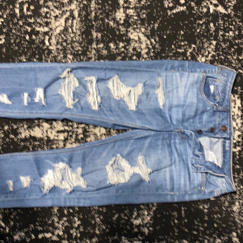 Distressed no zip button up jeans